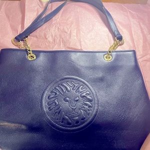 This is a slightly used bright blue Ann Klein